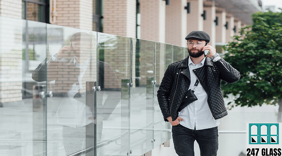 handsome-happy-worker-speaking-phone-drinking-coffee-goes-work-morning-modern-office Handsome happy worker speaking phone, drinking coffee and goes to work in the morning in a modern office. Good day.