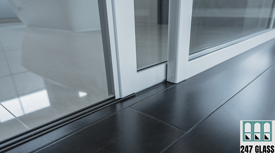 detail of sliding door frame install with floor laminate and flo detail of sliding door frame install with floor laminate and floor tile joint together