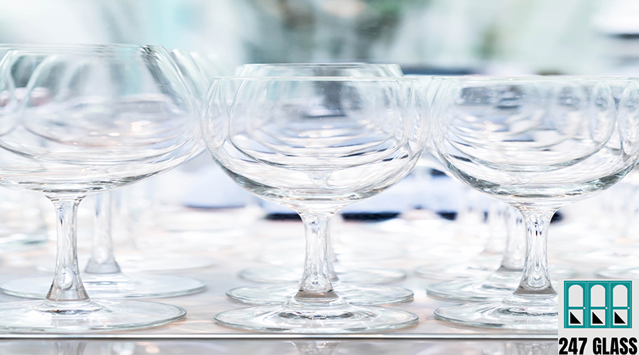 Many empty glasses in a line Glass Repair Services