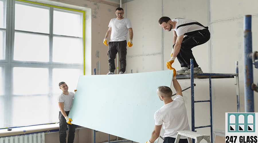 medium-shot-people-carrying-placard-together Window Installation for Retail Shop