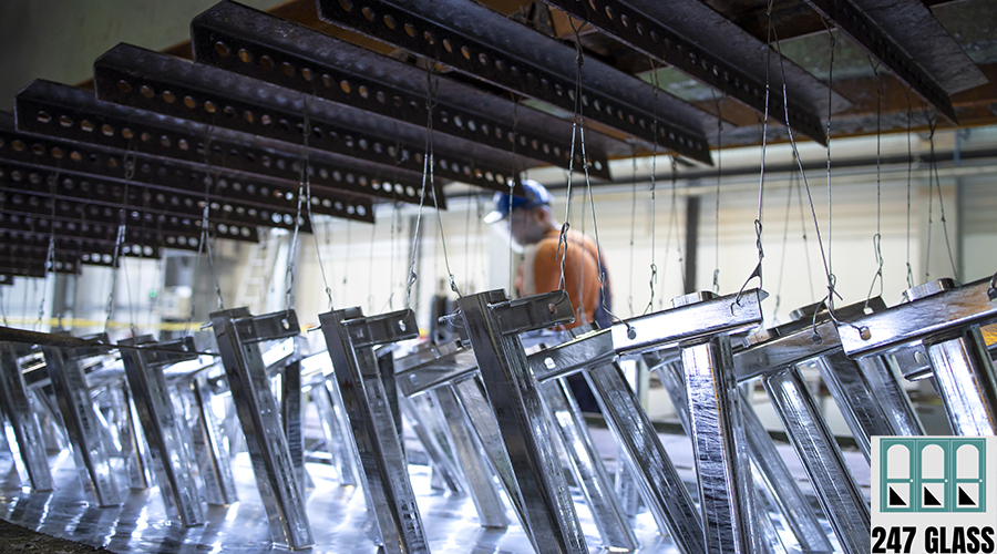 Metal parts being treated with zinc coating. Metal parts being treated with zinc coating.