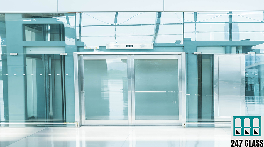 Transparent elevator in underground passage Window Installation for Retail Shops