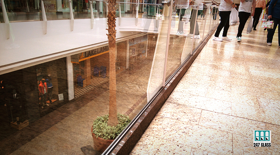 woman-standing-city Window Installation for Retail Shop