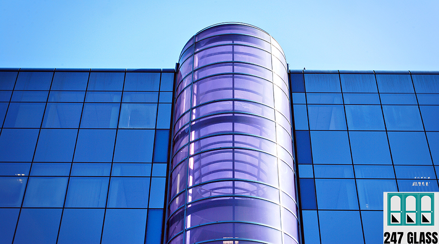 vecteezy_glass-building-with-transparent-facade-of-the-building-and_35294654 glass installer