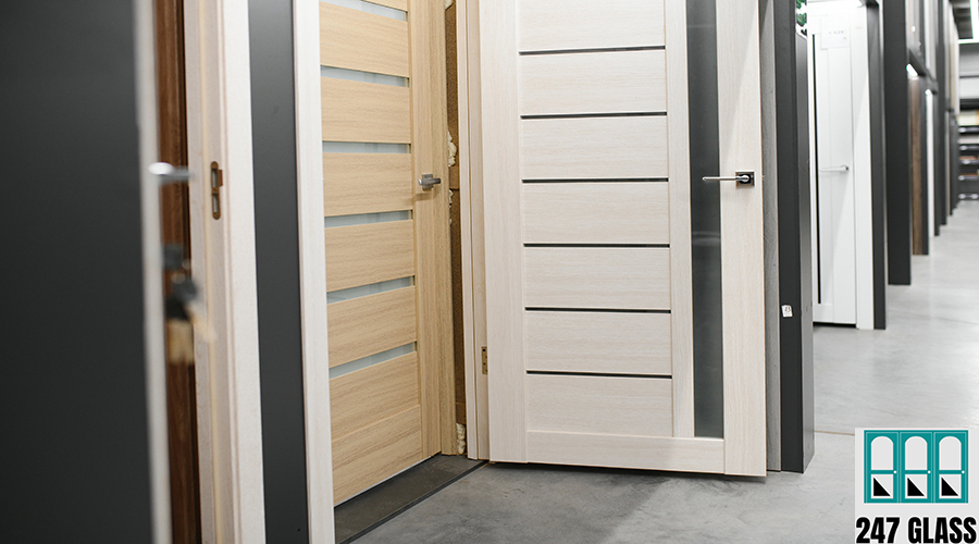 Shop window of doors. A large selection of doors for house commercial door service